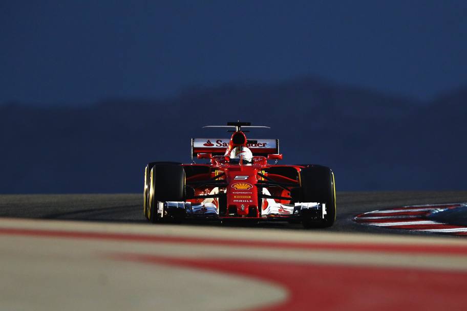 La Ferrari di Vettel scatter in seconda fila col terzo tempo. Getty 